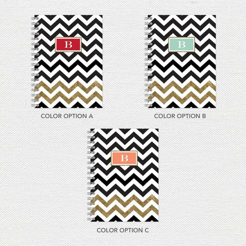 SparkGreetings® Black Chevron Writing Journal, three journal options with black and white chevron patterns and gold accents, featuring different color initials at the top.
