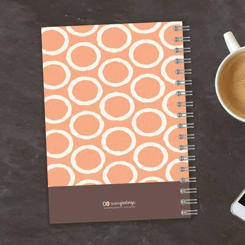 SparkGreetings® Tapestry Pattern Writing Journal, orange and white circular design on cover with a brown footer featuring the SparkGreetings logo and website.
