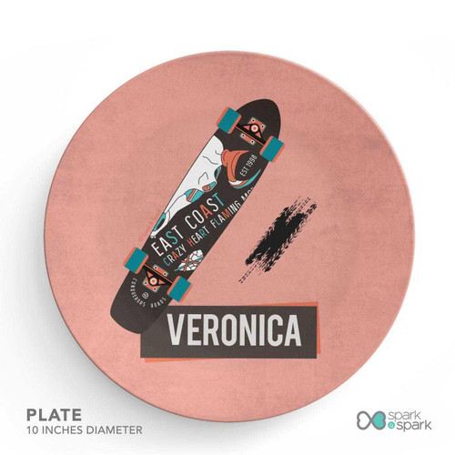 Spark & Spark Urban Skate Pink Kids Bowl, round skateboard with colorful graphic design and the name Veronica, on a pink background.