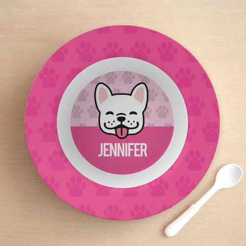 Spark & Spark Sweet Pink Pup Kids Bowl, pink bowl with a cartoon dog's face and the name Jennifer, pet paw print design, accompanied by a white spoon.