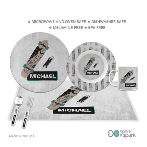 Spark & Spark Urban Skate Grey Personalized Boys Plate, featuring a skateboard design with the name 'Michael' on a grey background, alongside a matching mug, plate, and cutlery set.