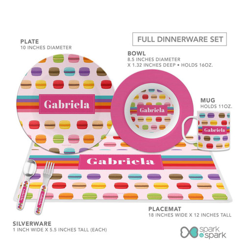 Spark & Spark Macaron Party Kids Placemat, colorful macaroon pattern with a customizable name 'Gabriela' in the center.