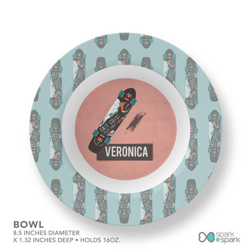 Spark & Spark Urban Skate Pink Kids Placemat, round pink and light blue skateboard-themed kids placemat with a customizable name 'Veronica' in bold letters.