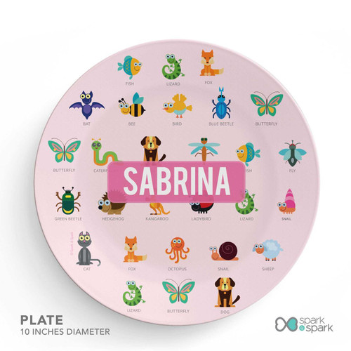 Spark & Spark Animal ABC Pink Kids Placemat, colorful animal illustrations with names on a pink background and the name Sabrina in bold pink text.