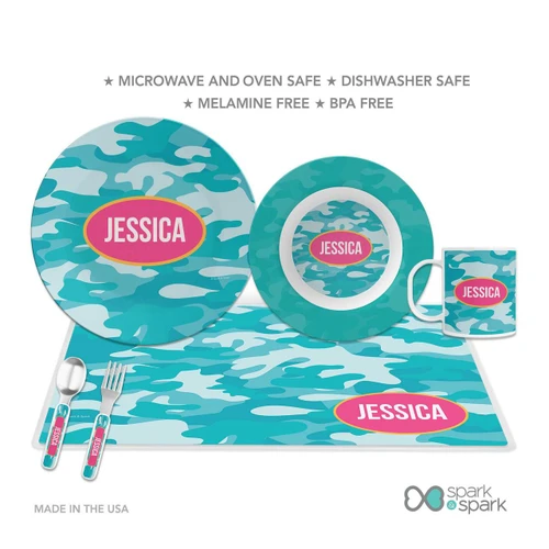 Spark & Spark Aqua Camouflage Kids Placemat, set of personalized dinnerware including a plate, bowl, mug, and placemat with aqua camouflage pattern and pink name label.