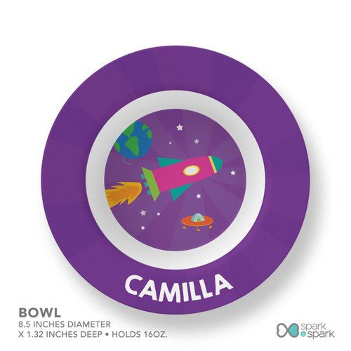 Spark & Spark Rocket Blast Girl Kids Placemat, colorful space-themed design with rocket, planets, stars, and the name Camilla on a purple background.