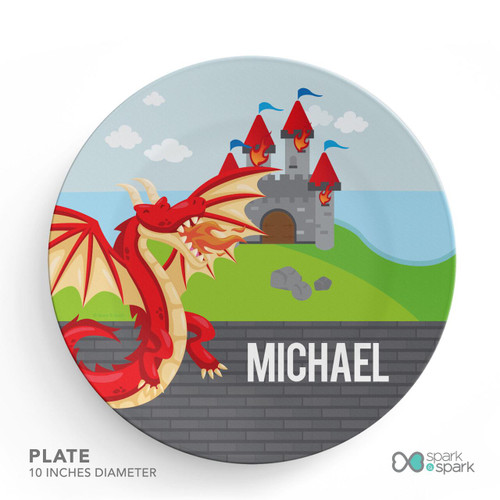 Spark & Spark Dragon Quest Kids Placemat, round plate featuring a cartoon dragon, a castle on a hill, and the name Michael in bold letters.