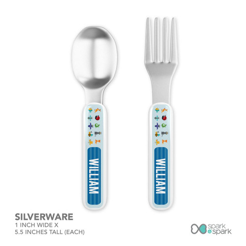 Spark & Spark Animal ABC Blue Kids Placemat, silverware set with colorful animal-themed design on handles.