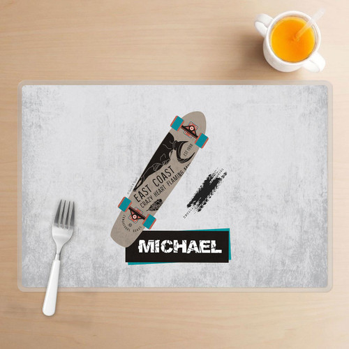 Spark & Spark Urban Skate Grey Kids Placemat, gray skateboard design with text and graphic elements on a light-colored table setting.