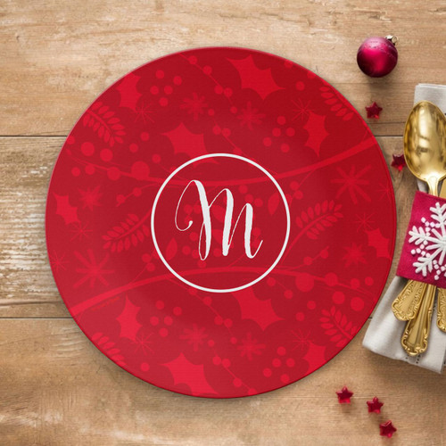 Spark & Spark Christmas Initial Holiday Placemat, red holiday themed placemat with white initial 'N' in the center surrounded by festive holly and snowflake patterns.