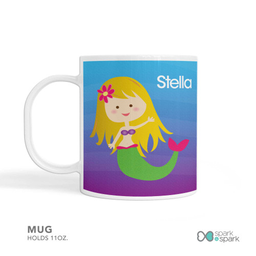 Personalized kids mug with cute blonde mermaid ocean background and name Stella on blue gradient