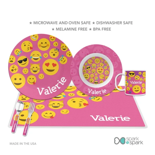 Personalized kids plate with colorful emoji faces on pink background and name Valerie