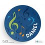 Spark & Spark Musical Notes Kids Placemats, a round blue placemat with colorful musical notes and the name 'DANIEL' printed on it.