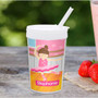 Spark & Spark Ballerina Studio Toddler Cup, colorful illustrated ballet dancer girl holding pose on pink background with a pink lid and straw.