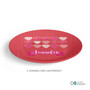 Spark & Spark Full of Hearts Kids Plates, pink oval plate with multiple colorful heart designs and a personalized name 'Jennifer' in the center.