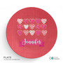 Spark & Spark Full of Hearts Kids Placemat, round red kids placemat with a heart and sprinkles pattern and the name Jennifer printed on it.