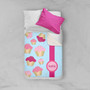 Spark & Spark Sweet Cupcakes Sherpa Blanket, personalized with the name Sophie, featuring colorful cupcake illustrations on a light blue background with pink accents.
