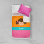 Spark & Spark Just Like Me Girl Orange Sherpa Blanket, colorful children's blanket with a girl illustration and the name Lola, on a bed with pink and white pillows.