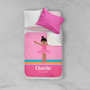 Spark & Spark Sweet Ballerina Sherpa Blanket, pink blanket with a ballerina girl illustration and the name Charlie, loved by ballet, on a bed with white and pink pillows.