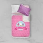Spark & Spark Three Sweet Cupcakes Sherpa Blanket on toddler bed with personalized cupcake design and name Alexandra, pink and purple color scheme.