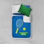Spark & Spark Tennis Fan Sherpa Blanket, blue blanket with tennis racket, tennis ball, and personalized name Rafael on it, laying on a bed with pillows.