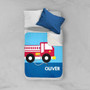 Spark & Spark Cool Firetruck Sherpa Blanket, colorful firetruck design with the name Oliver embroidered on it.