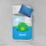 Spark & Spark Cute Smiley Frog Sherpa Blanket, a colorful children's blanket with a smiling frog design and the name David on it, placed on a bed with pillows.