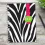 SparkGreetings® Zebralicious Writing Journal, a black and white zebra print notebook with a pink polka dot ribbon and green 'acb' label on the cover.