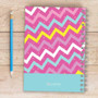 SparkGreetings® Mix Chevrons Writing Journal, spiral-bound notebook with pink, yellow, white, and blue chevron pattern on the cover.