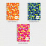 SparkGreetings® Dynamic Ways Writing Journal, colorful geometric patterned cover in orange, blue, and pink color options.