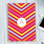SparkGreetings® Style in Stripes Writing Journal, colorful striped design with a monogrammed letter 'A' on the cover.