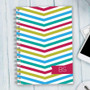 SparkGreetings® Beautiful Colors Writing Journal, notebook with colorful chevron striped cover design in red, green, blue, and white.