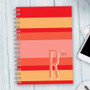SparkGreetings® Bold and Modern Writing Journal, colorful striped cover with a large letter R and personalized name text.