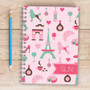 SparkGreetings® Paris Chic Style Writing Journal, pink themed Parisian-themed design with Eiffel Tower, dogs, wine glasses, coffee cups, hearts, and perfume bottles illustrations.