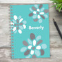 SparkGreetings® Stamped Blossoms Writing Journal, teal cover with floral design and personalized name Beverly.