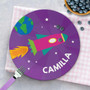 Spark & Spark Rocket Blast Custom Plate for Girls, colorful space-themed plate with a pink and purple rocket, stars, and the name Camilla, topped with blueberries.