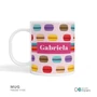 Spark & Spark Macaron Party Kids Placemat, personalized with the name Gabriela, featuring colorful macarons on a pink background.
