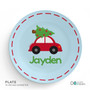 Spark & Spark Here Comes The Xmas Tree Kids Placemat, round blue children's placemat with a red car carrying a Christmas tree and the name Jayden in green text.