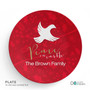 Spark & Spark Peace On Earth Holiday Placemat, round red holiday-themed placemat with a white dove and festive holly and berry background, personalized with 'Peace on Earth' and the Brown Family's name.