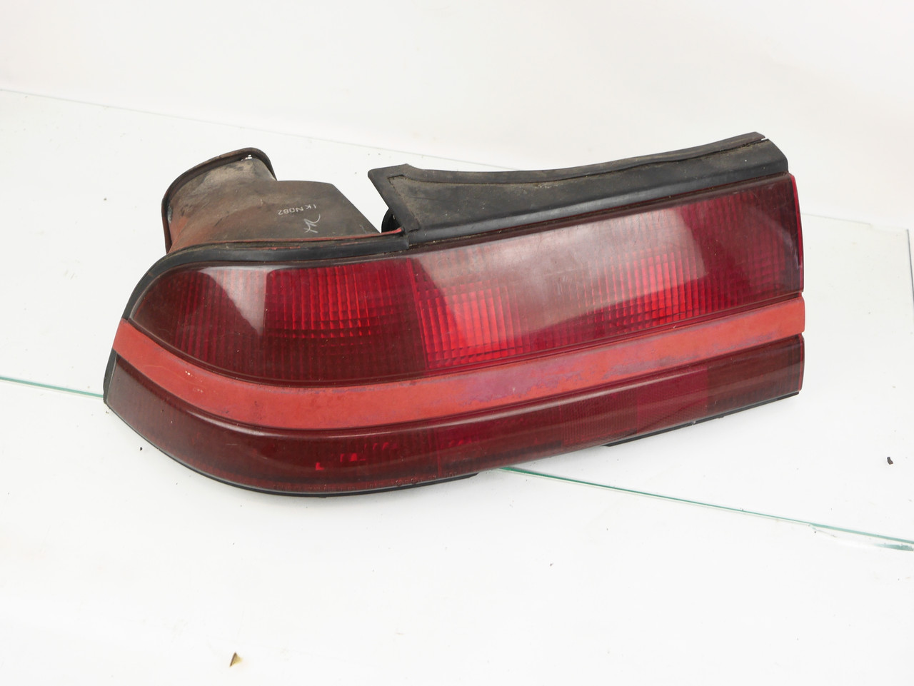 Tail light 90-91 Eclipse Left Driver (Red Fade stripe)