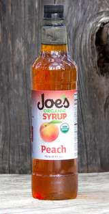 Joe's organic Peach syrup is so good, you can almost taste the fuzz on the skins. Available year round. Made with care, using organic cane sugar, organic peach, and just enough citric acid to give it the snappiness of a peach fresh off the tree. Joe's organic Peach syrup is so good, you can almost taste the fuzz on the skins. Available year round. Made with care, using organic cane sugar, organic peach, and just enough citric acid to give it the snappiness of a peach fresh off the tree.