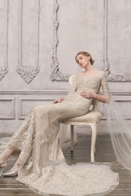 Shop The Atelier Couture Long Fitted Cape Sleeve Gown