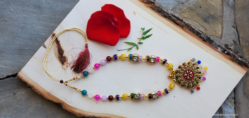 Circular grand floral pendant with multicolor beaded necklace