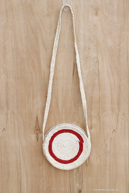 Circular zippered red and white hand-made jute bag with extra long sling