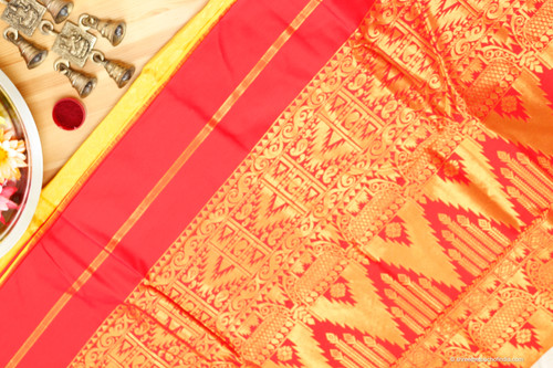 Exquisite red and mustard Kanchipuram silk saree with golden zari pallu