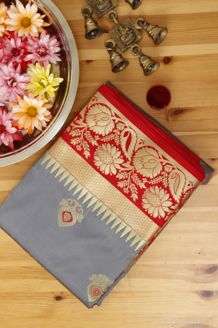Modern grey and red soft silk with intricate golden zari pallu