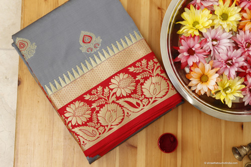 Modern grey and red soft silk with intricate golden zari pallu