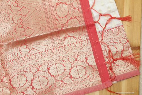 Hues of rose and white gorgeous golden zari embellished silk saree