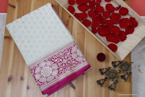 Luxurious white and pink regal Banarasi Katan silk saree with lush golden and silver zari