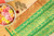 Grand red and golden zari silk saree with a green pallu embellished with zari